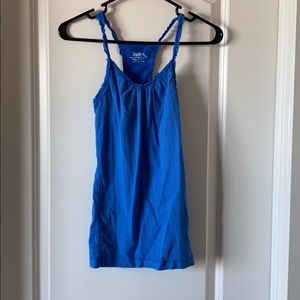 Blue racer back with lace trim.